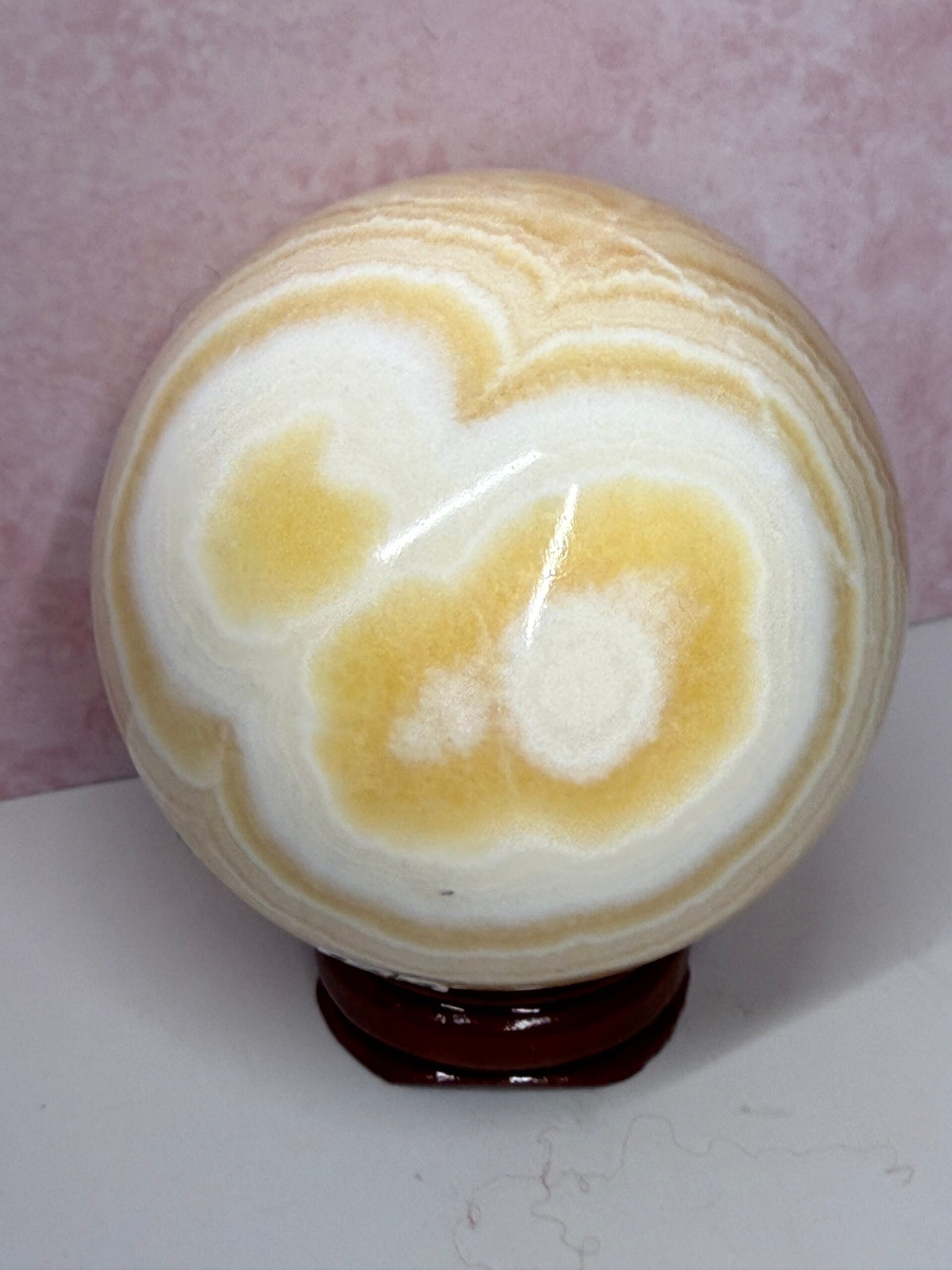Banded Orange Calcite Sphere - Image 3