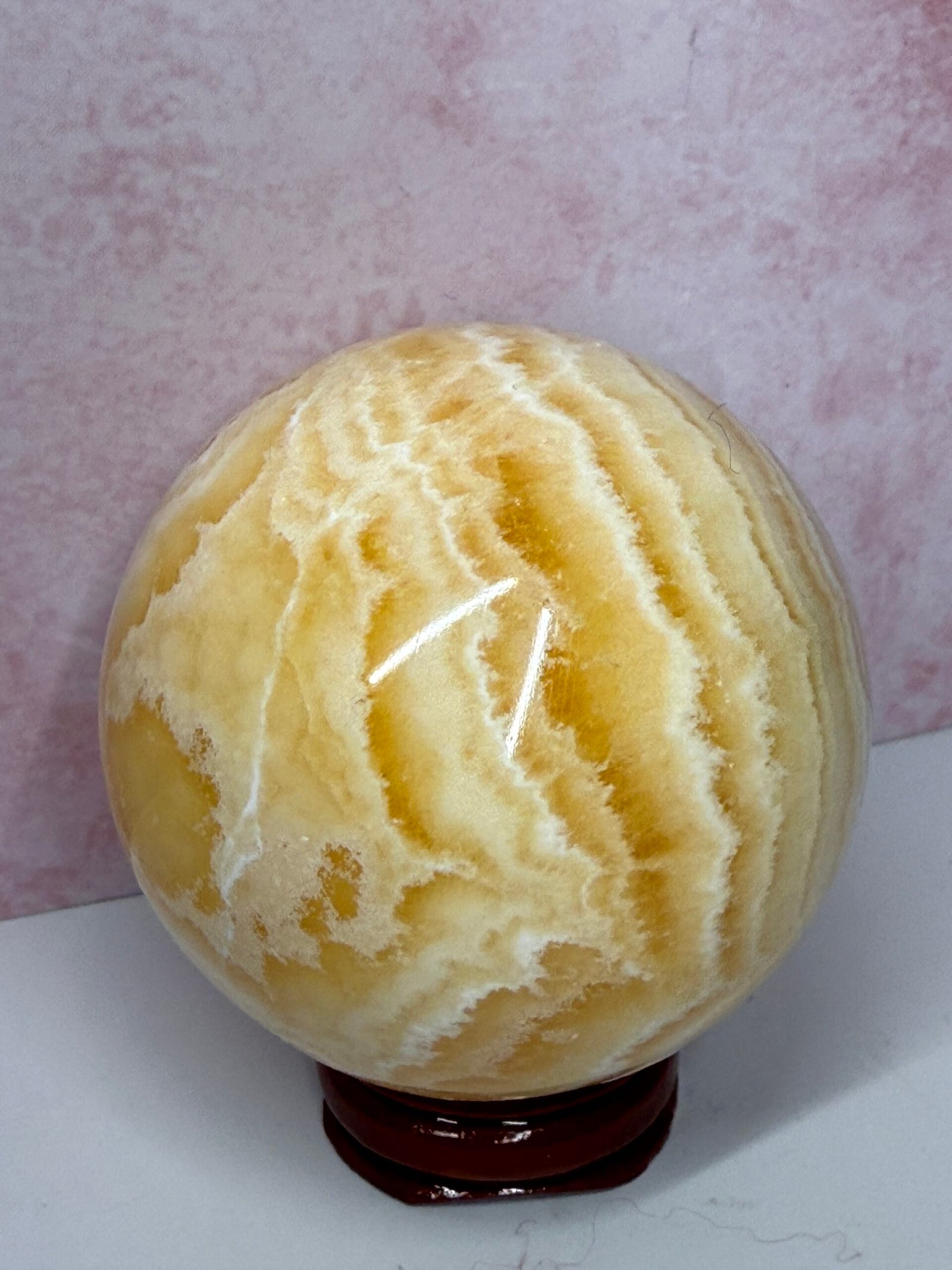 Banded Orange Calcite Sphere - Image 4