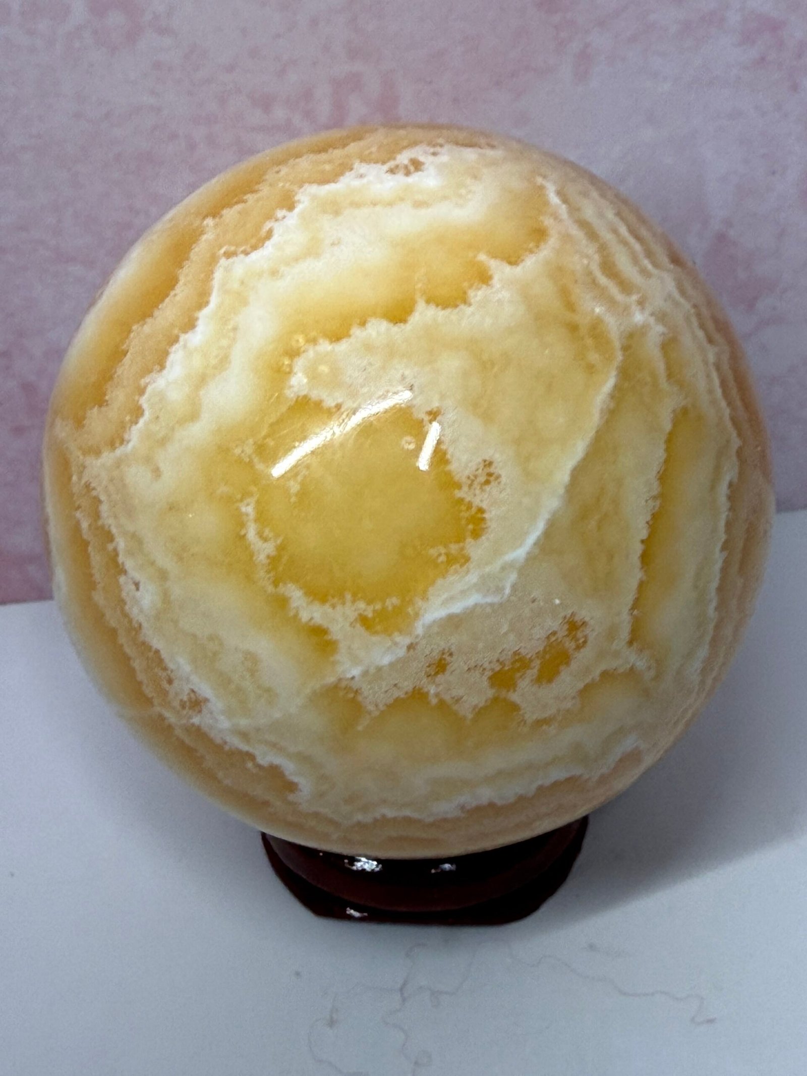 Banded Orange Calcite Sphere - Image 5
