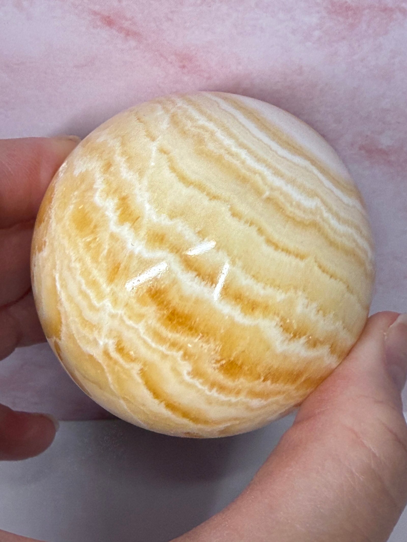 Banded Orange Calcite Sphere - Image 6