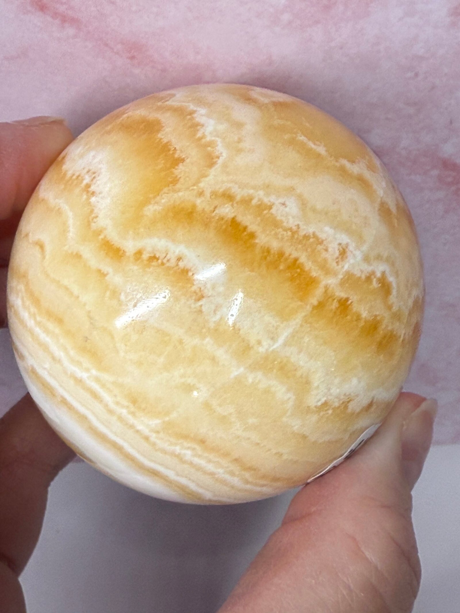 Banded Orange Calcite Sphere - Image 7