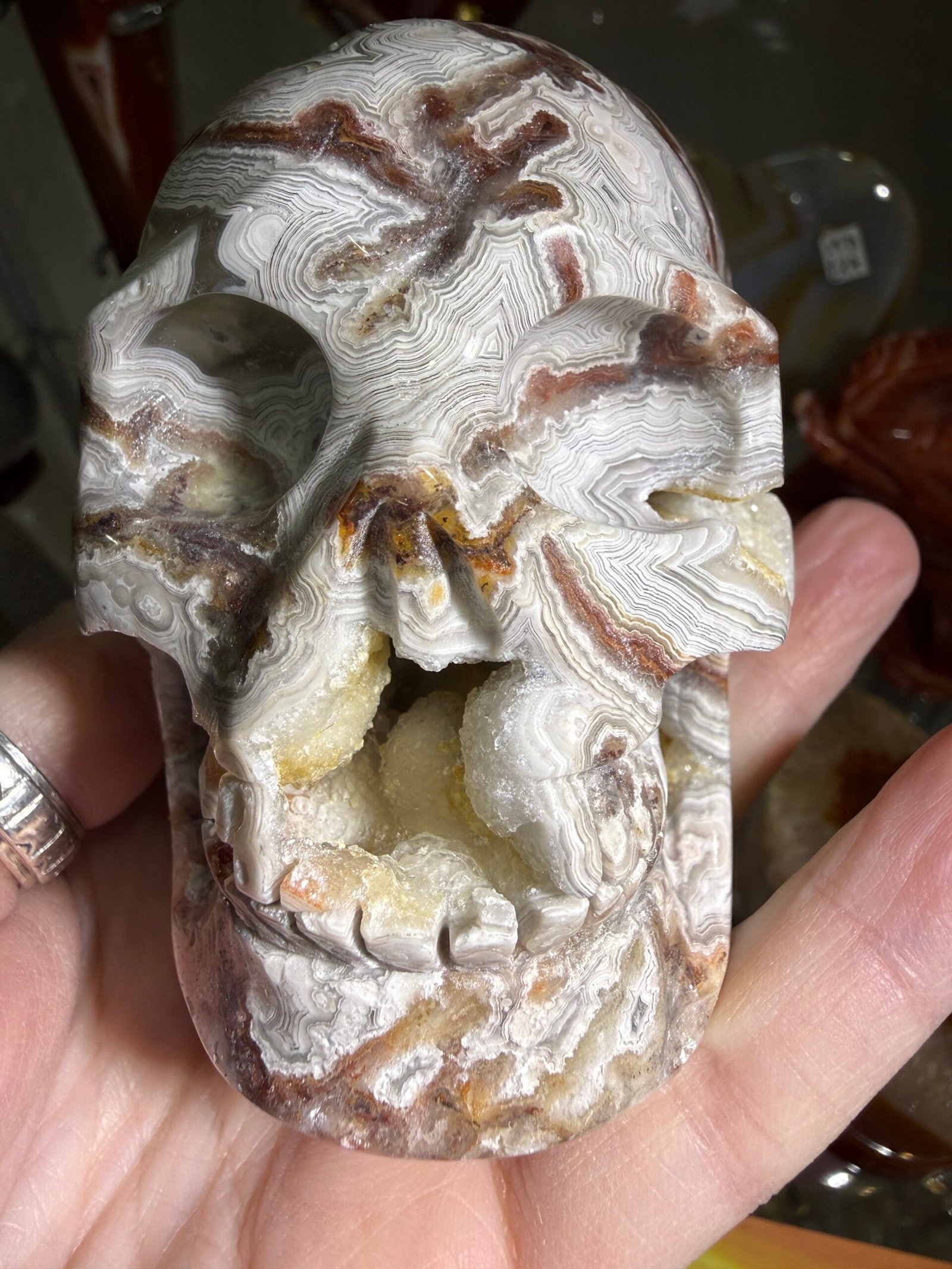 Crazy Lace Agate Skull Carving - Image 2