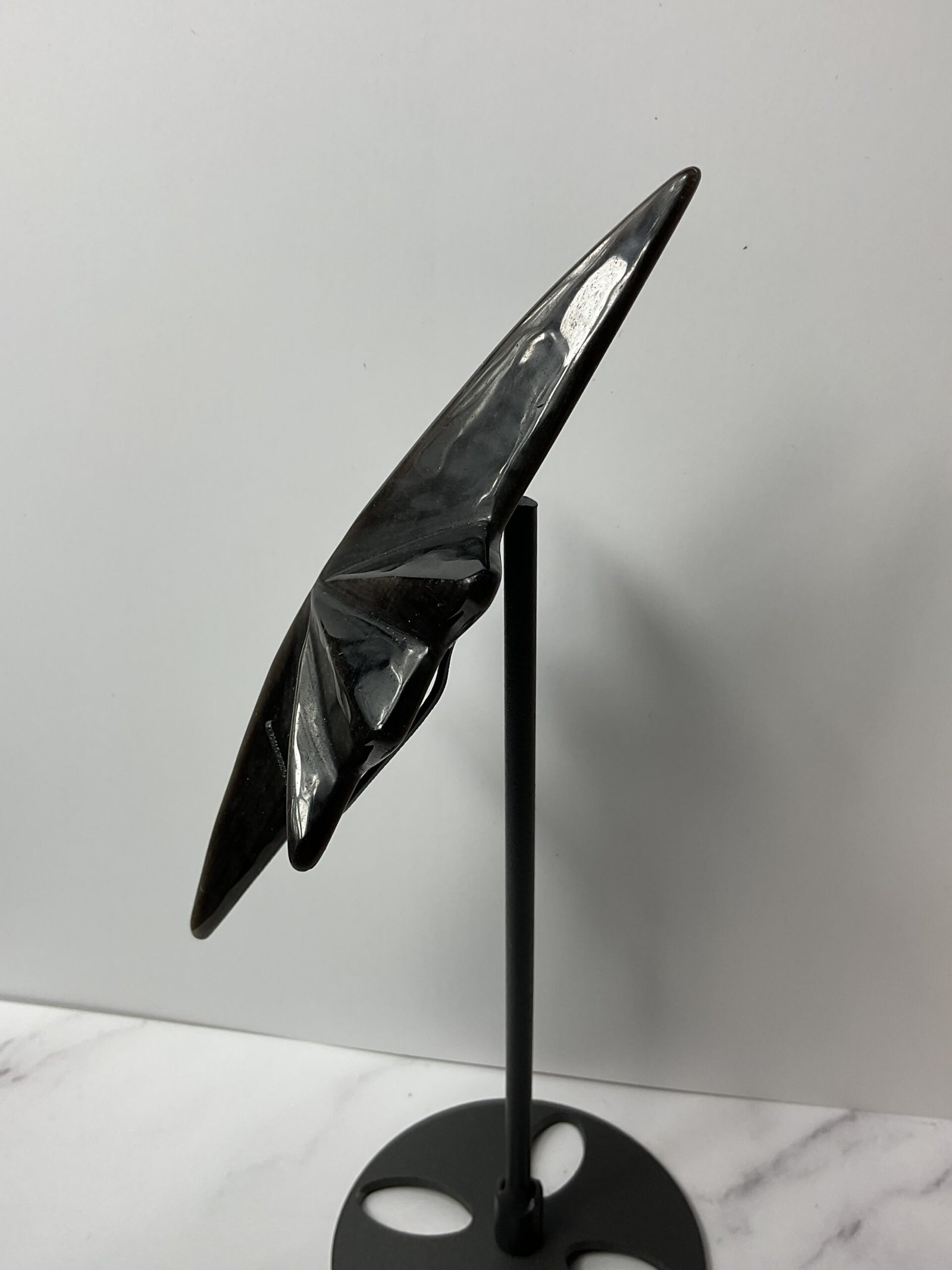 Silver Sheen Obsidian North Star Carving on Stand - Image 4